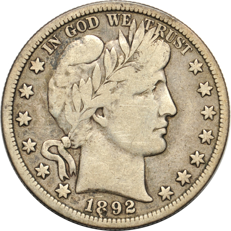 Complete set of Barber half-dollars in Library of Coins Vol. 17 & 18 albums.