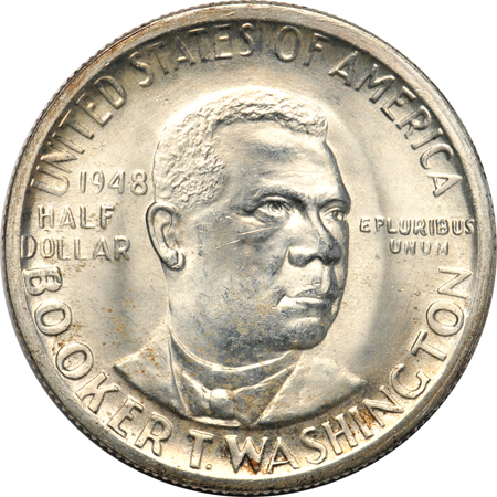 Eighteen-piece Booker T. Washington half-dollar set in a National Coin Album.