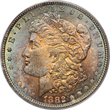 Four 1882 and one 1885 PCGS certified Morgan dollars, toned.