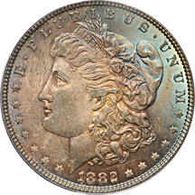 Four 1882 and one 1885 PCGS certified Morgan dollars, toned.