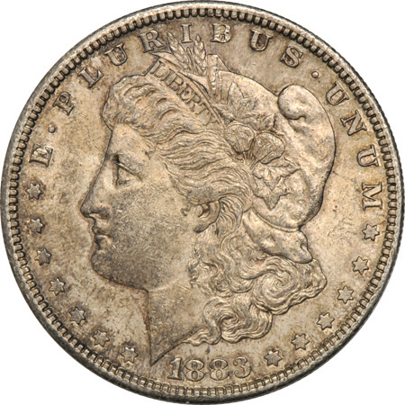 Seven XF/AU "S" mint Morgan dollars.