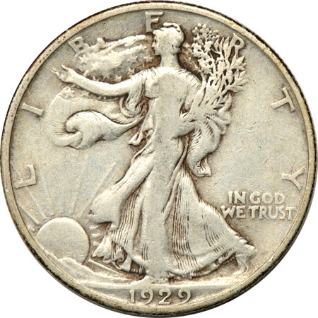 Thirty collector date Walking Liberty half-dollars.