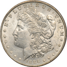 Four PCGS certified Morgan dollars.