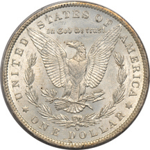 Four PCGS certified Morgan dollars.