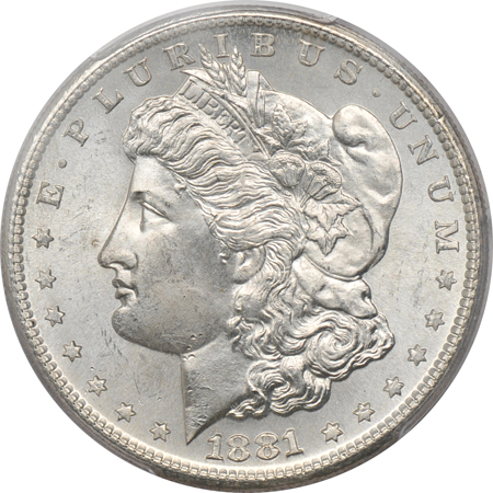 Four Morgan dollars graded MS-65 by PCGS.