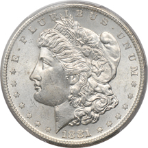 Four Morgan dollars graded MS-65 by PCGS.