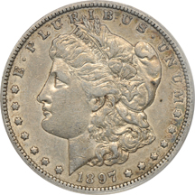 Three Morgan dollars, plus a commemorative half-dollar, all ANACS.