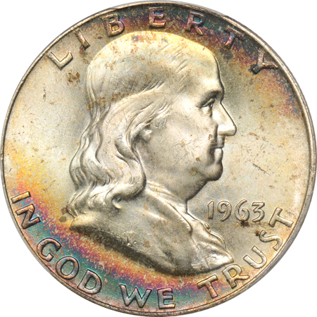 Five PCGS certified Franklin half-dollars, toned.