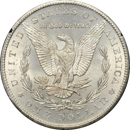 Seven photo-certified Morgan dollars.