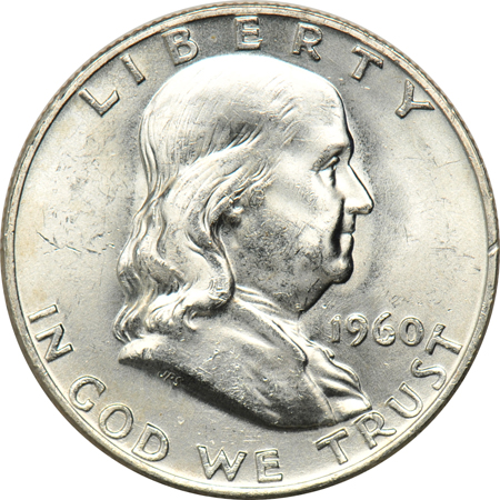 Twenty 1958, and twenty 1960-D Franklin half-dollars.