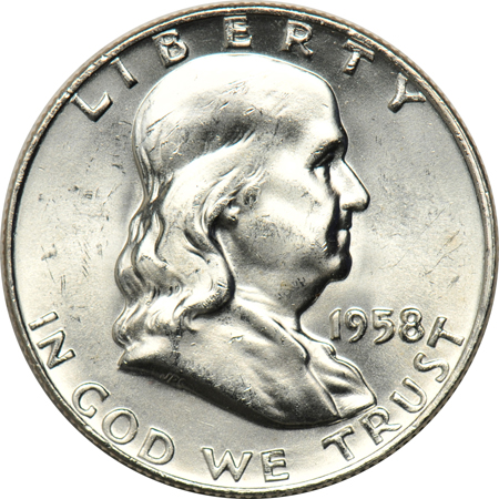 Twenty 1958, and twenty 1960-D Franklin half-dollars.