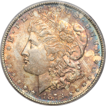 Four toned silver dollars certified by PCGS.