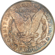 Four toned silver dollars certified by PCGS.