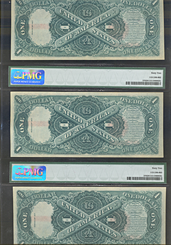 Run of three 1917 $1 in a single PMG CU-62 holder.