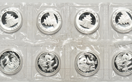 China - Uncut sheet of eight 2005 1oz Silver Panda coins.