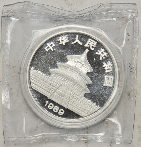 China - Double sealed 1989 1oz Silver Panda, plus two 2009 Silver Panda coins in capsules.