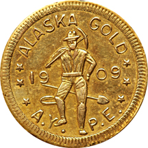 1871 California half-dollar, plus two Alaska Yukon gold coins.