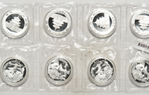 China - Uncut sheet of eight 2005 1oz Silver Panda coins.