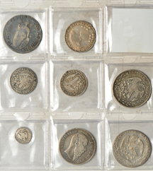 World Coins - Bolivia, Mexico, and Peru - Group of thirteen silver coins.