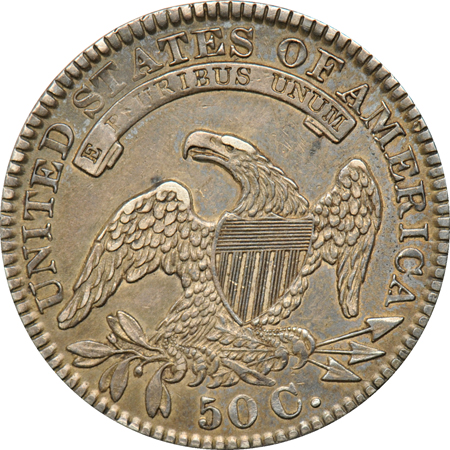 Three half-dollar type coins.