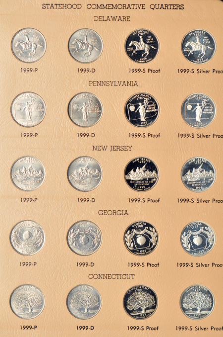 Statehood quarters in four albums.