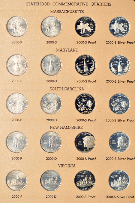 Statehood quarters in four albums.