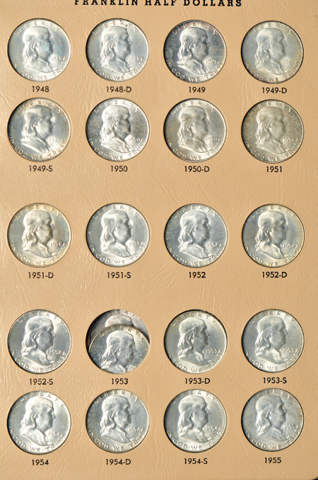 Collection of mostly BU Franklin half-dollars in a Dansco 7165 album.