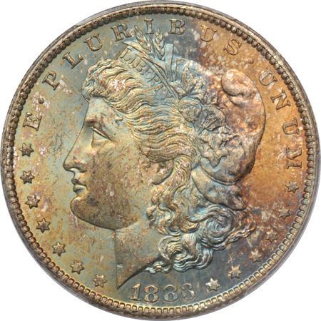 Four toned Morgan dollars, all certified.