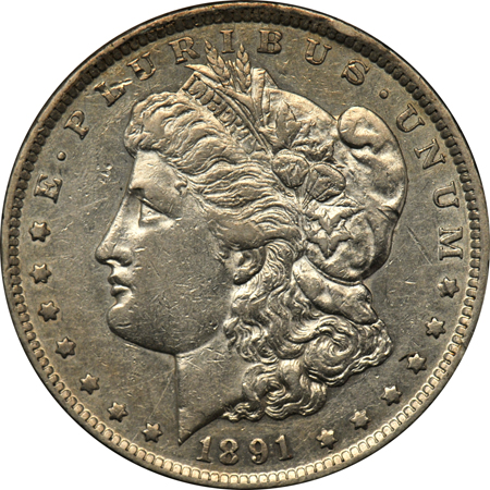 Mostly complete collection of Morgan silver dollars, 1891 through 1921, in a Dansco 7179 album.