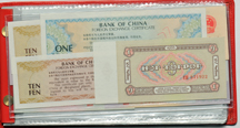 China - 1980 People's Bank of China currency collection in red wallet.