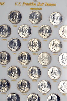 Complete collection of Franklin half-dollars in Capital Plastics case.