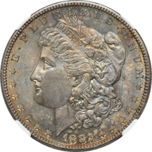 Five toned Morgan dollars, all certified MS-65.