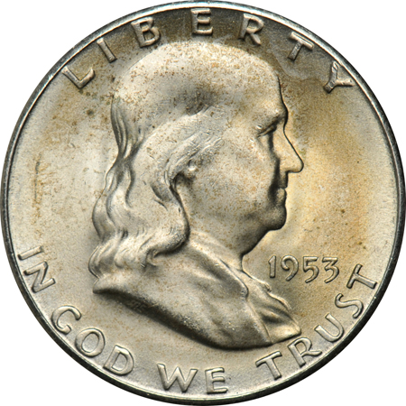 Two tubes of 1953 Franklin half-dollars.