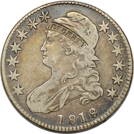 Seven Capped Bust half-dollars.