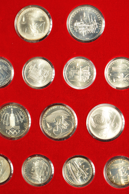 Russia - Collection of Olympics coins in a red binder.