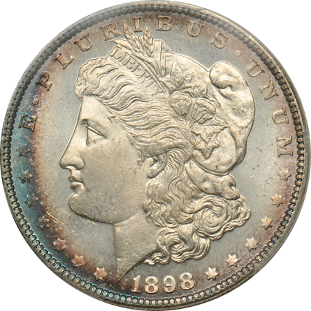 Four Uncirculated Morgan dollars certified by PCGS.