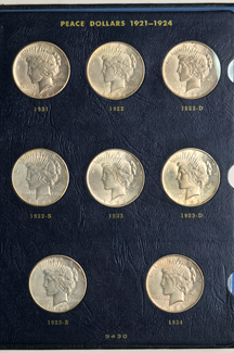 Complete collection of Peace dollars in a Whitman 9430 album.