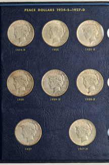 Complete collection of Peace dollars in a Whitman 9430 album.