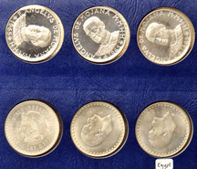 World - Group of silver Crowns in a Whitman 9454 album.