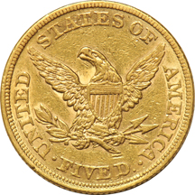 Four U.S. gold coins.  Three quarter eagles and one half eagle.