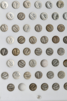 Seventy-two different Mercury dimes in a Capital Plastics holder.