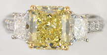 Platinum and 18K Yellow Gold Diamond Ring with a Fancy Yellow Diamond